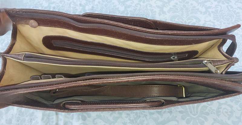 A GENUINE LEATHER EXECUTIVE BRIEFCASE BURGUNDY BROWN MADE IN ARGENTINA SOLD AS IS