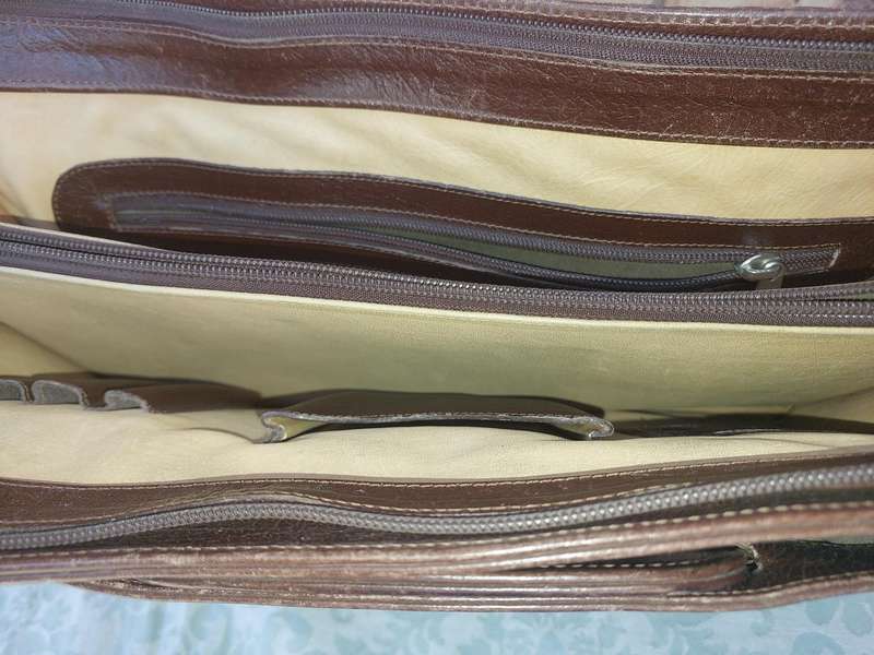 A GENUINE LEATHER EXECUTIVE BRIEFCASE BURGUNDY BROWN MADE IN ARGENTINA SOLD AS IS