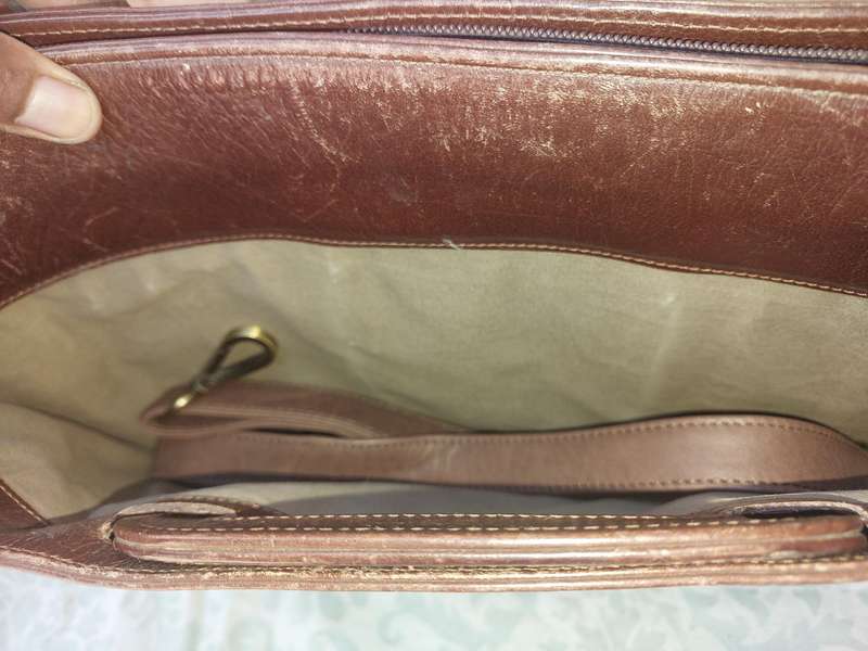 A GENUINE LEATHER EXECUTIVE BRIEFCASE BURGUNDY BROWN MADE IN ARGENTINA SOLD AS IS