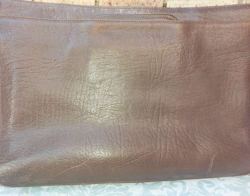 A GENUINE LEATHER EXECUTIVE BRIEFCASE BURGUNDY BROWN MADE IN ARGENTINA SOLD AS IS