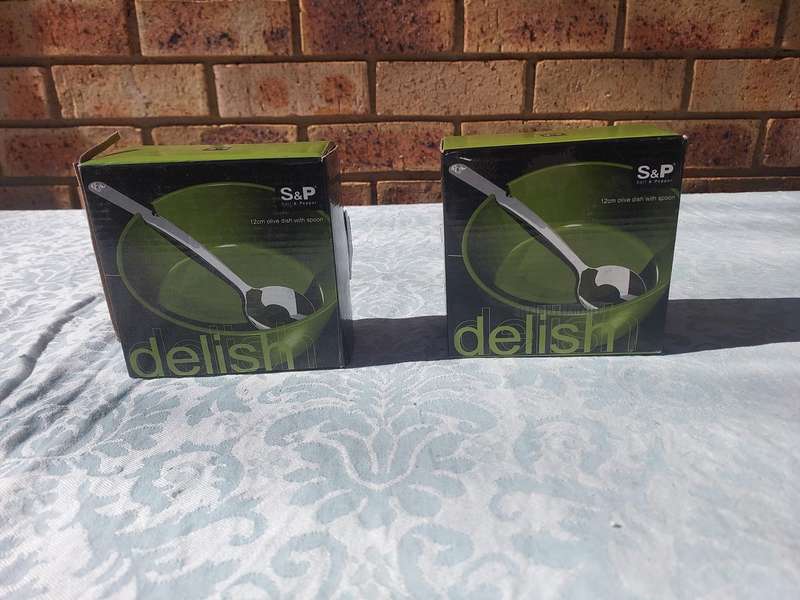 TWO DELISH S A & P OLIVE DISHES WITH SPOONS SOLD AS IS