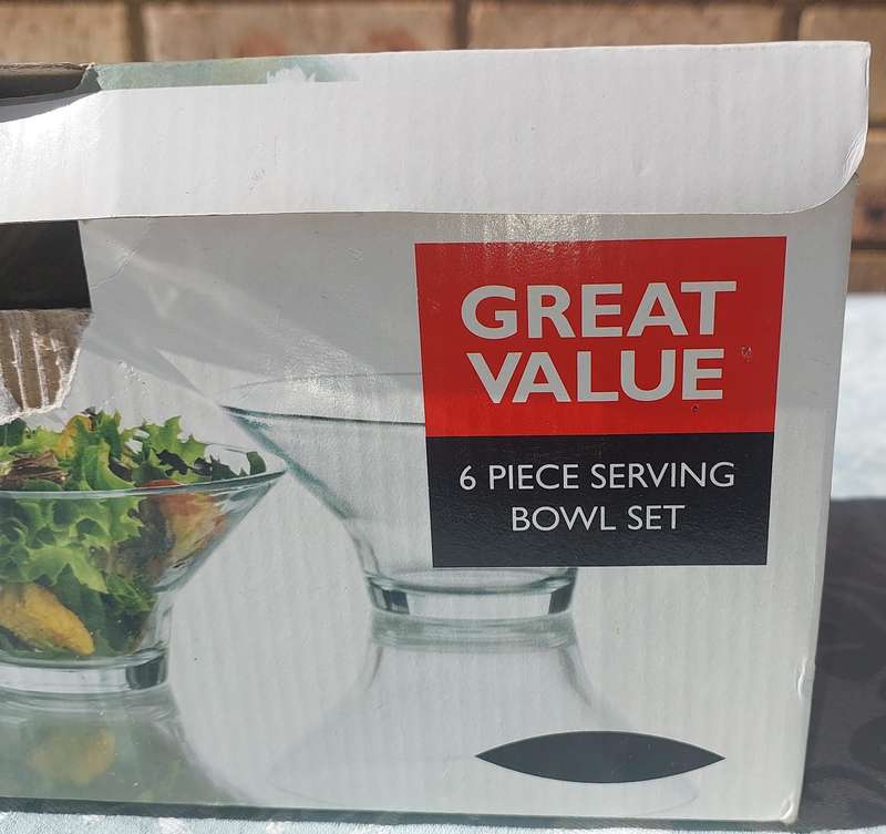 A SET OF 6 GLASS  SERVING BOWLS SOLD AS IS