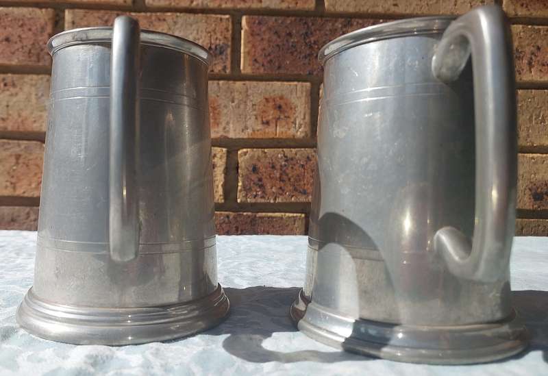 TWO VINTAGE PEWTER BEER MUGS SOLD AS IS