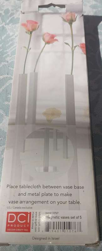 Magnetic vase sold as is