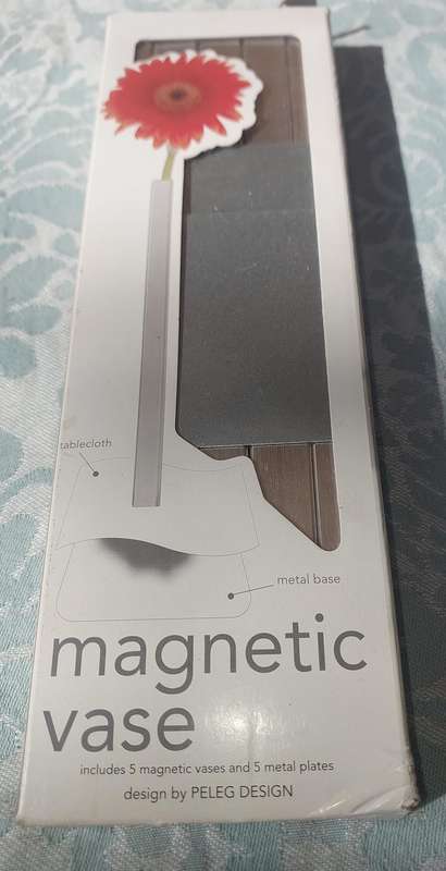 Magnetic vase sold as is
