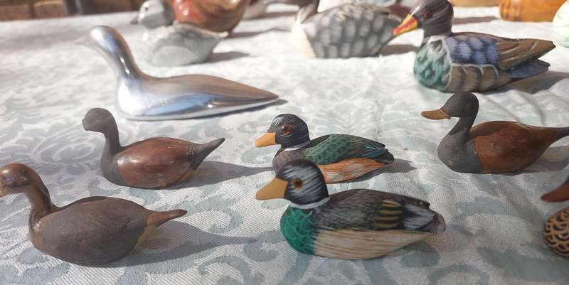 AN ENTIRE COLLECTION DUCK DECOYS AND FIGURINES SOLD AS IS