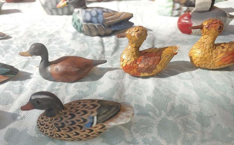 AN ENTIRE COLLECTION DUCK DECOYS AND FIGURINES SOLD AS IS