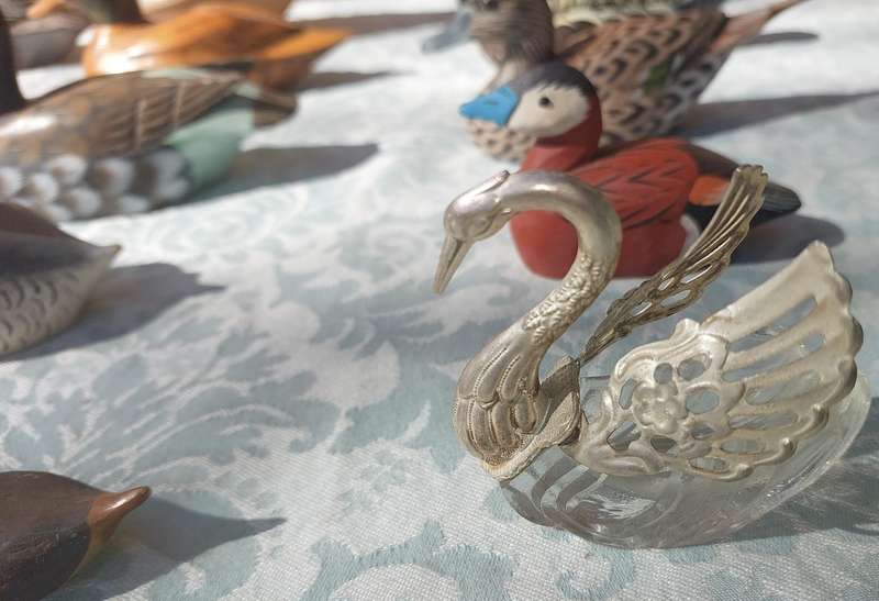 AN ENTIRE COLLECTION DUCK DECOYS AND FIGURINES SOLD AS IS