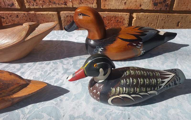 AN ENTIRE COLLECTION DUCK DECOYS AND FIGURINES SOLD AS IS