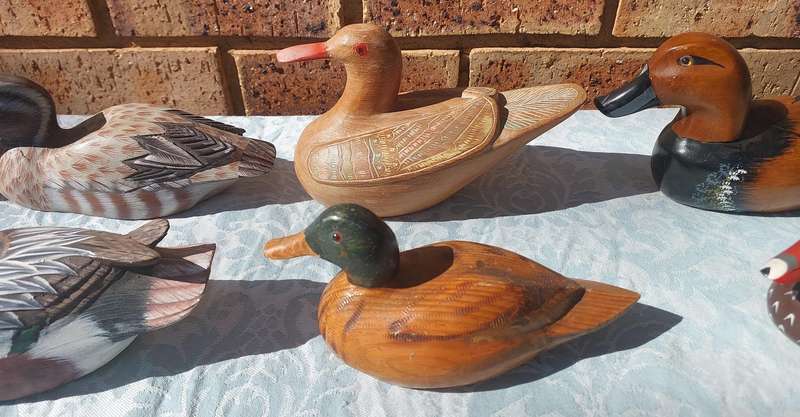 AN ENTIRE COLLECTION DUCK DECOYS AND FIGURINES SOLD AS IS