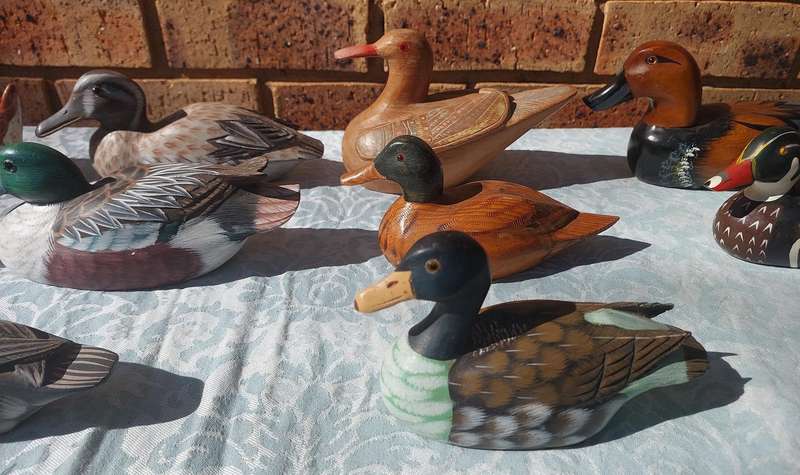 AN ENTIRE COLLECTION DUCK DECOYS AND FIGURINES SOLD AS IS