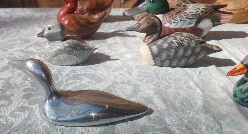 AN ENTIRE COLLECTION DUCK DECOYS AND FIGURINES SOLD AS IS