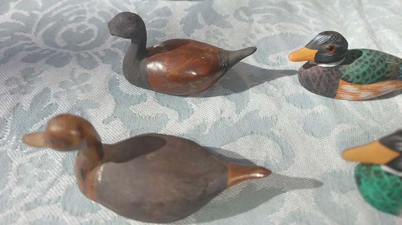 AN ENTIRE COLLECTION DUCK DECOYS AND FIGURINES SOLD AS IS