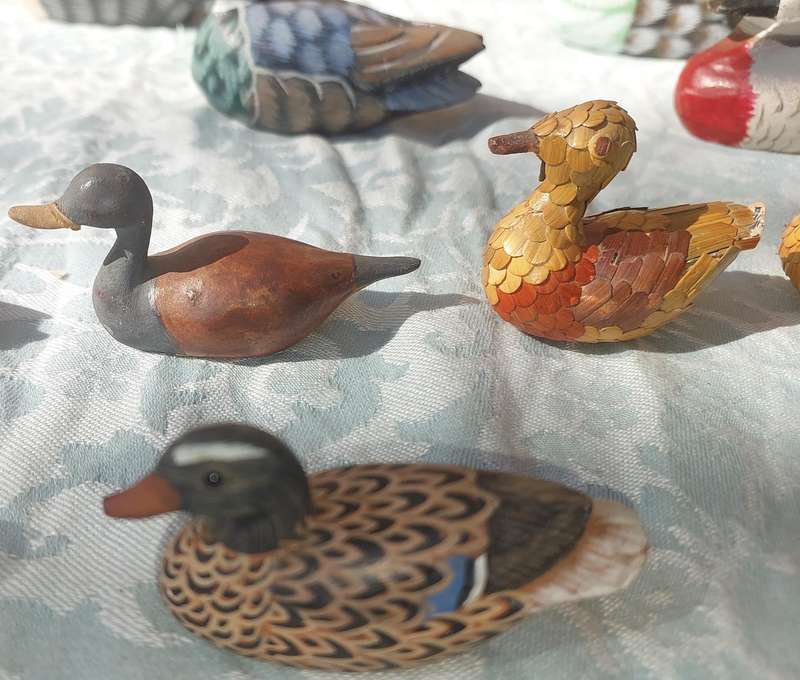 AN ENTIRE COLLECTION DUCK DECOYS AND FIGURINES SOLD AS IS