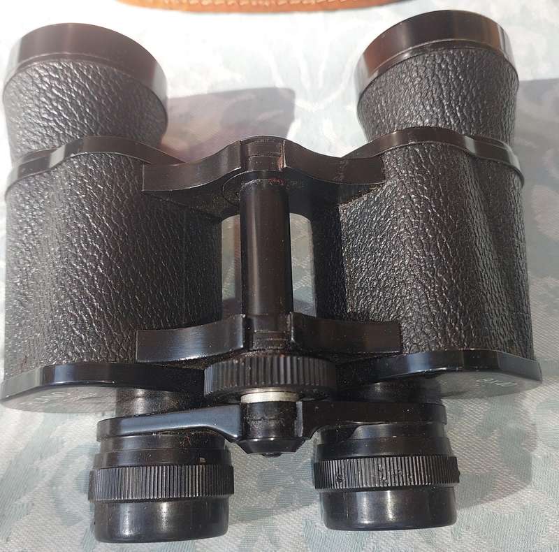 A vintage plano 8x40 binoculars sold as is