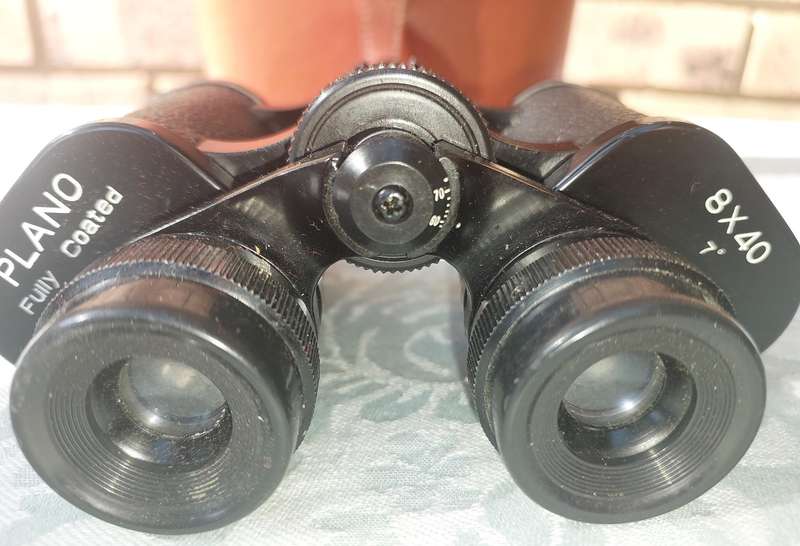 A vintage plano 8x40 binoculars sold as is