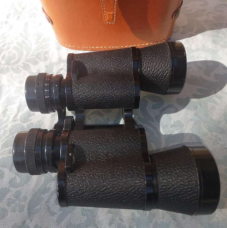 A vintage plano 8x40 binoculars sold as is