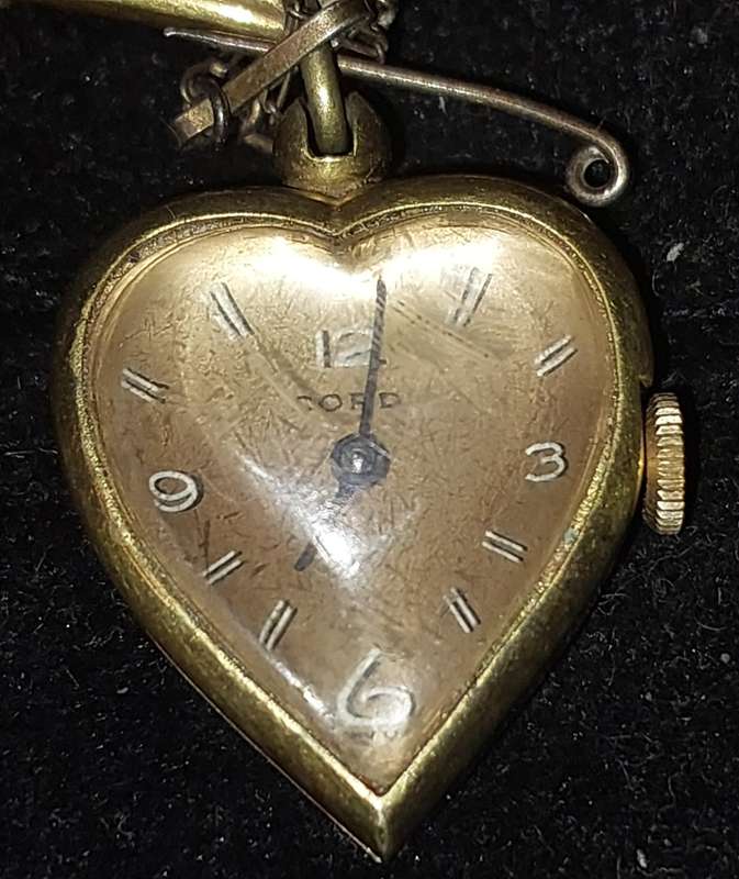A VINTAGE CORD MODELE DEP  SN, 329372 JUVENE SWISS BROOCHE WATCH MACHANICAL SOLD AS IS