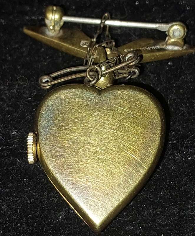 A VINTAGE CORD MODELE DEP  SN, 329372 JUVENE SWISS BROOCHE WATCH MACHANICAL SOLD AS IS