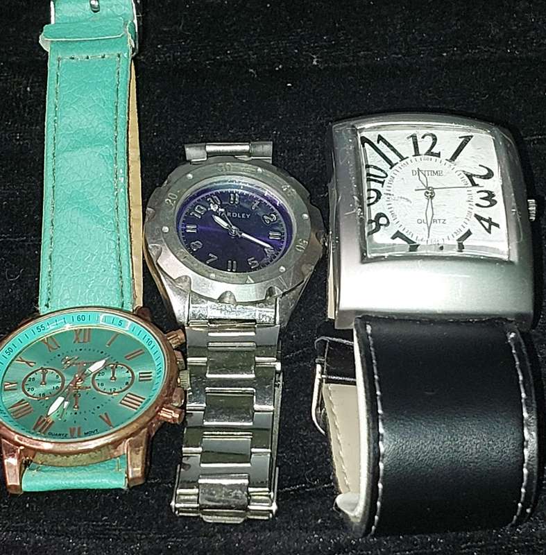 A COLLECTION OF 3 FASHION COSTUME WATCHES SOLD AS IS NOT TESTED