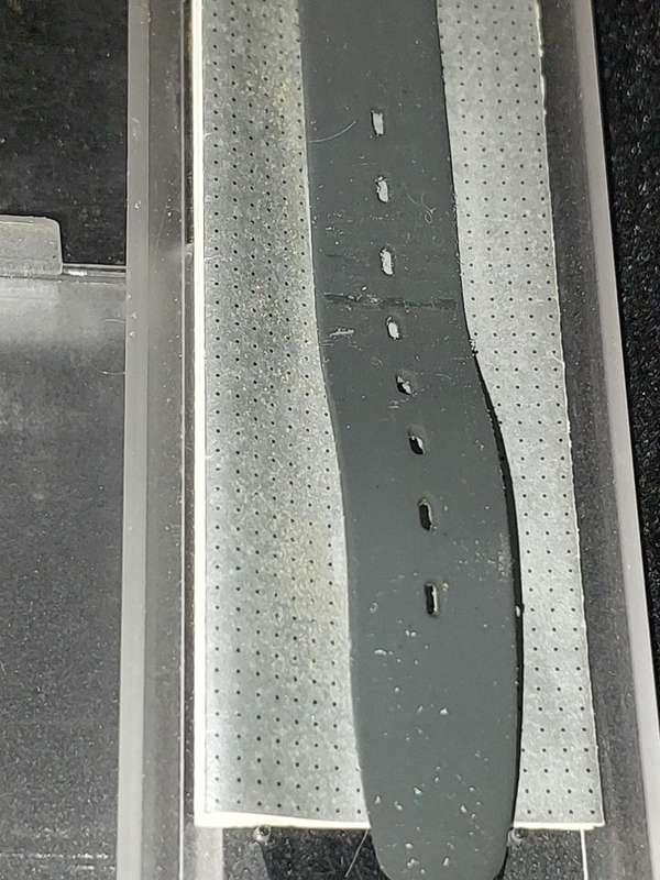 A UNISEX SWATCH RUBBER WATCH MISSING THE BATTERY COVER SOLD AS IS NOT TESTED