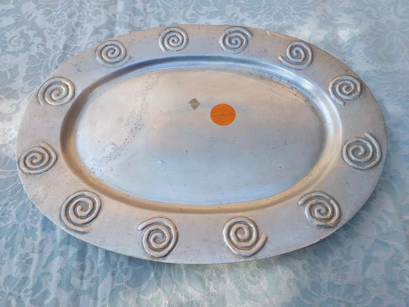 A VINTAGE HAND MADE PEWTEL OVAL SERVING PLATTER SOLD AS IS