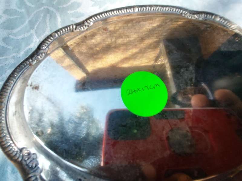 A COLLECTION OF SILVER PLATED SERVING TRAYS SOLD AS IS