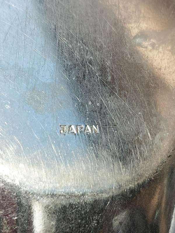 AN OVAL MADE IN JAPAN PEWTEL SERVING TRAY SOLD AS IS