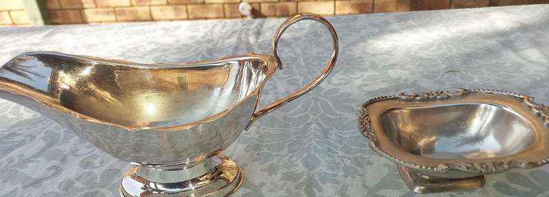 TWO VINTAGE UTENSILS A SAUCE BOAT AND A BUTTER DISH SOLD AS IS