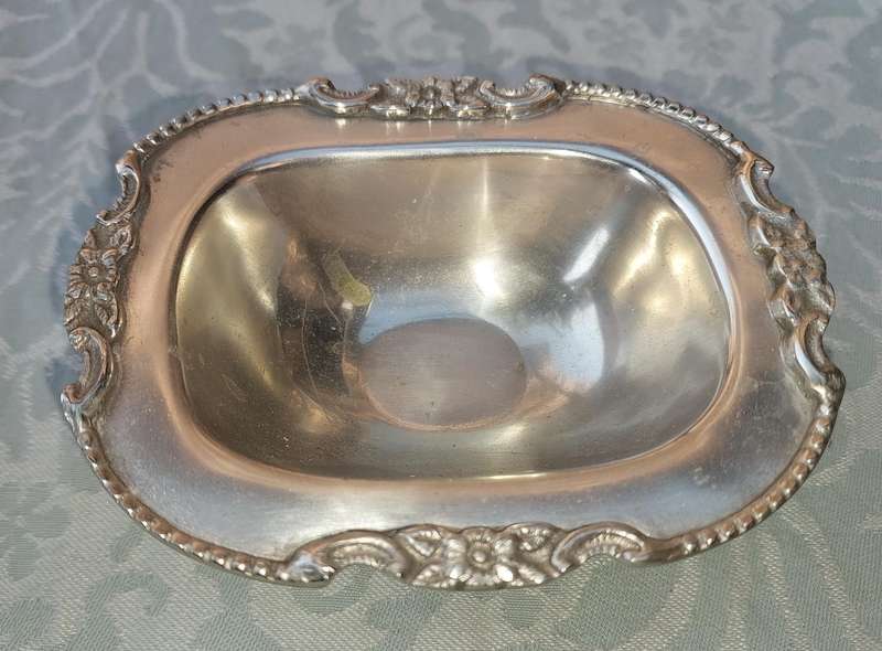 TWO VINTAGE UTENSILS A SAUCE BOAT AND A BUTTER DISH SOLD AS IS