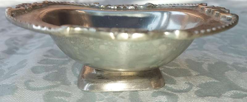 TWO VINTAGE UTENSILS A SAUCE BOAT AND A BUTTER DISH SOLD AS IS