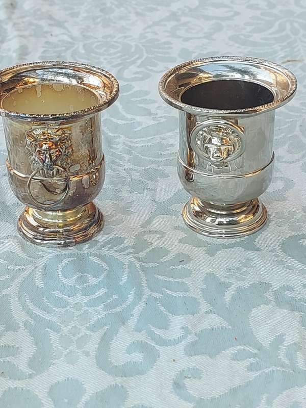 A COLLECTION OF5 LION HEAD TOOTH PIK HOLDERS SOLD AS IS SILVER PLATED