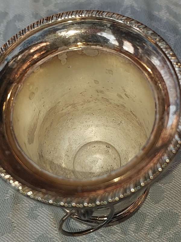 A COLLECTION OF5 LION HEAD TOOTH PIK HOLDERS SOLD AS IS SILVER PLATED