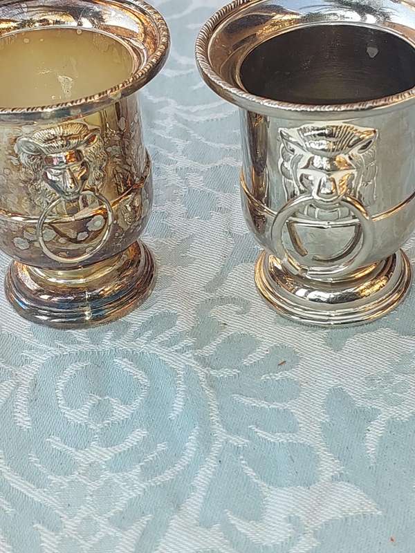 A COLLECTION OF5 LION HEAD TOOTH PIK HOLDERS SOLD AS IS SILVER PLATED