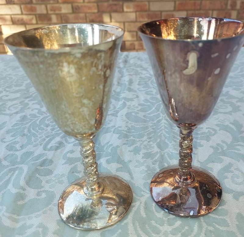 TWO VINTAGE SILVER PLATED WINE GOBLETS SOLD S IS