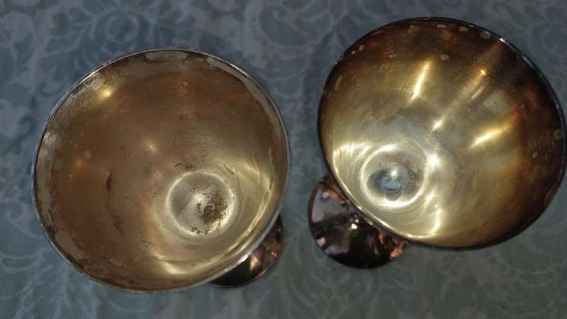 TWO VINTAGE SILVER PLATED WINE GOBLETS SOLD S IS
