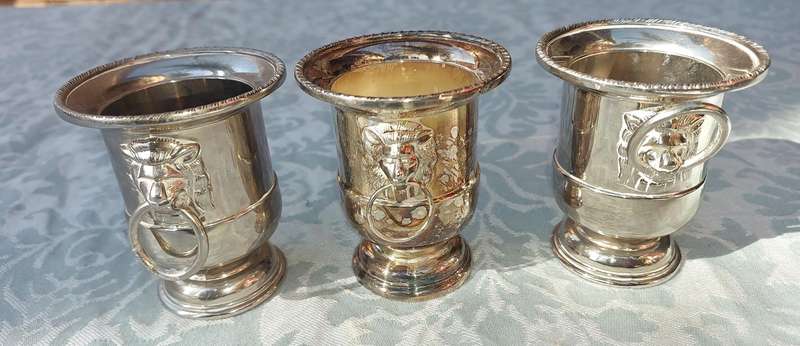 A COLLECTION OF5 LION HEAD TOOTH PIK HOLDERS SOLD AS IS SILVER PLATED