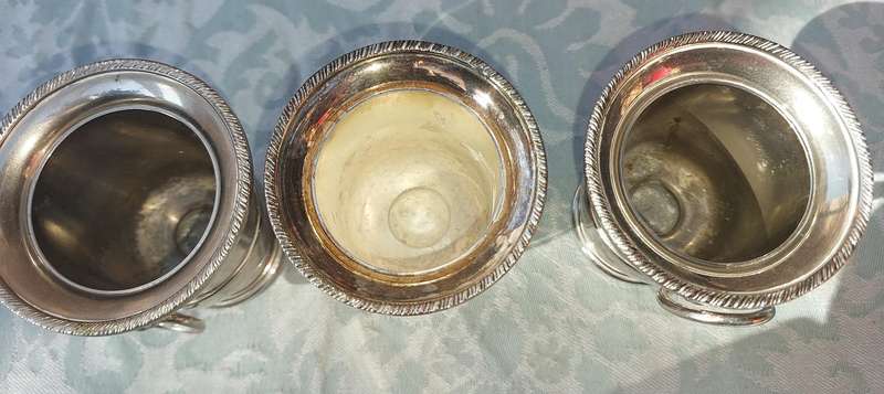 A COLLECTION OF5 LION HEAD TOOTH PIK HOLDERS SOLD AS IS SILVER PLATED