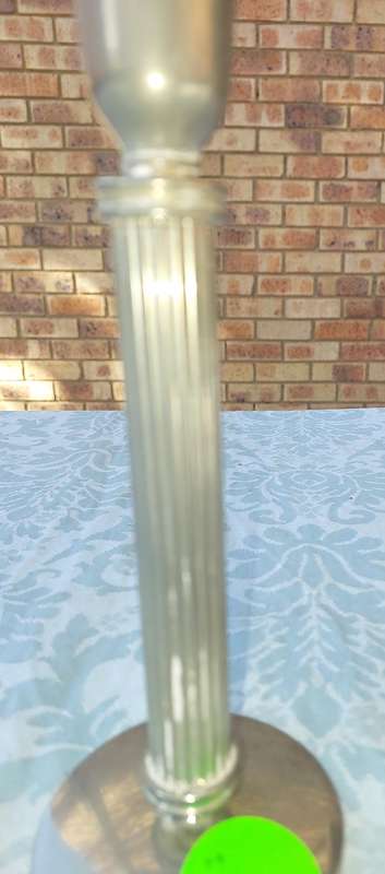 A VINTAGE SET OF ROMAN STYLE SILVER PLATED CANDLE HOLDERS SOLD AS IS