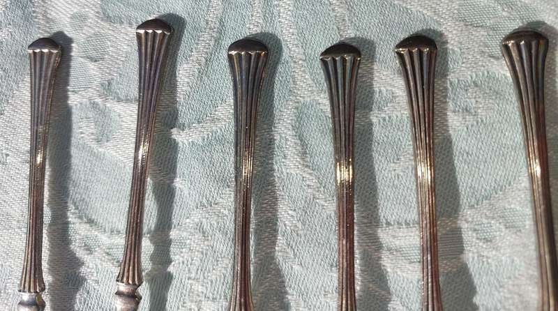 A VINTAGE SET OF DESERT FORKS SOLD AS IS
