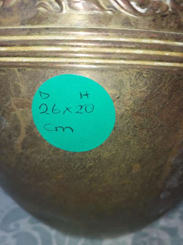 AN ORNATE BRASS PLANTER SOLD AS IS