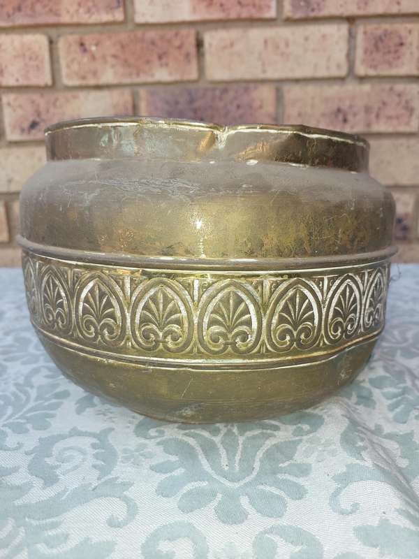 AN ORNATE MORROCAN STYLE PLANTER NEED SOME TLC SOLD AS IS