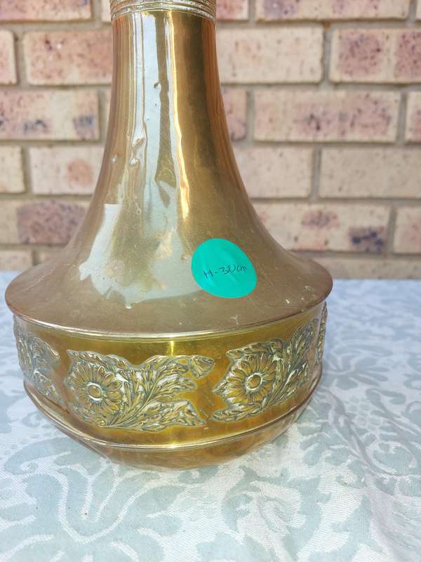 A VINTAGE ORNATE BRASS VASE MADE IN HOLAND SOLD AS IS
