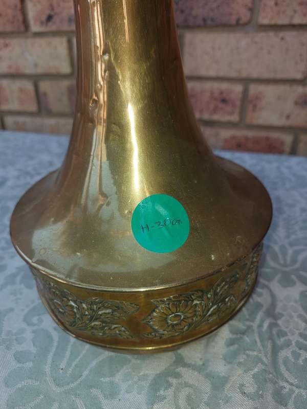 A VINTAGE ORNATE BRASS VASE MADE IN HOLAND SOLD AS IS