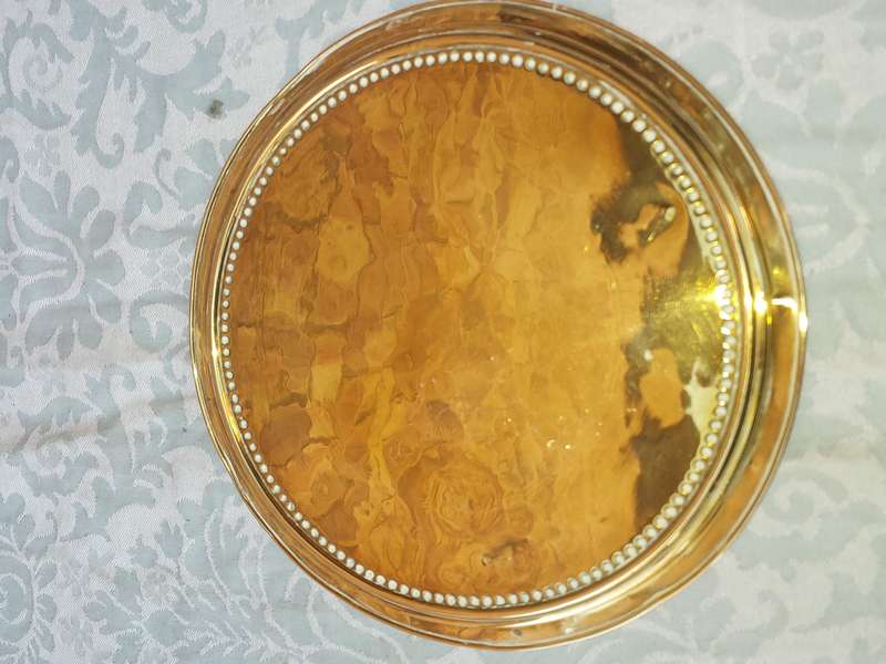 A VINTAGE BRASS TEA SERVING TRAY SOLD AS IS