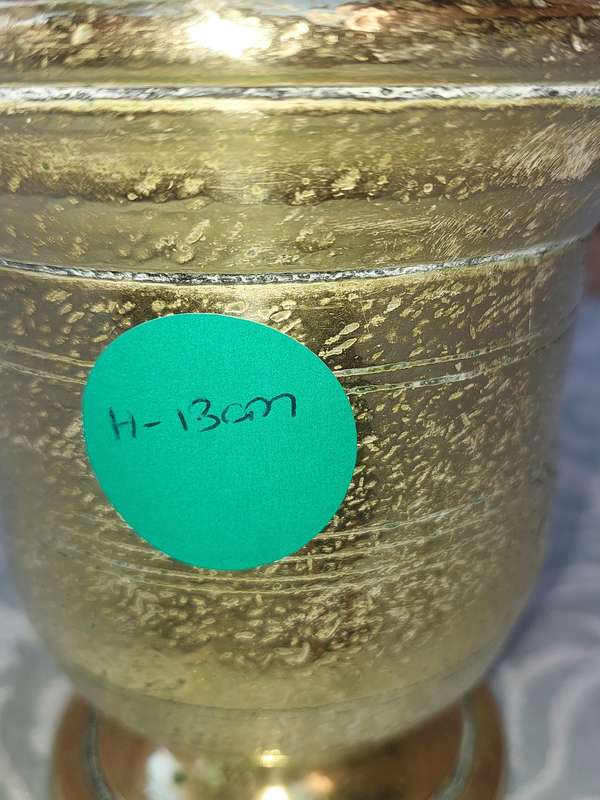 A HEAVY DUTY BRASS PASTEL AND MORTER SOLD AS IS