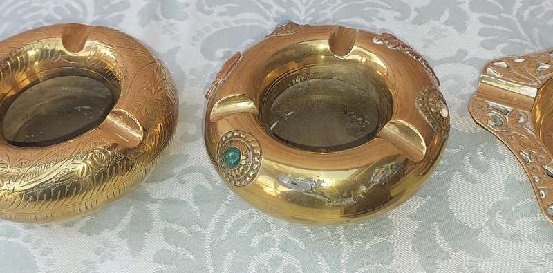 A COLLECTION OF ART DECOR ASHTRAYS