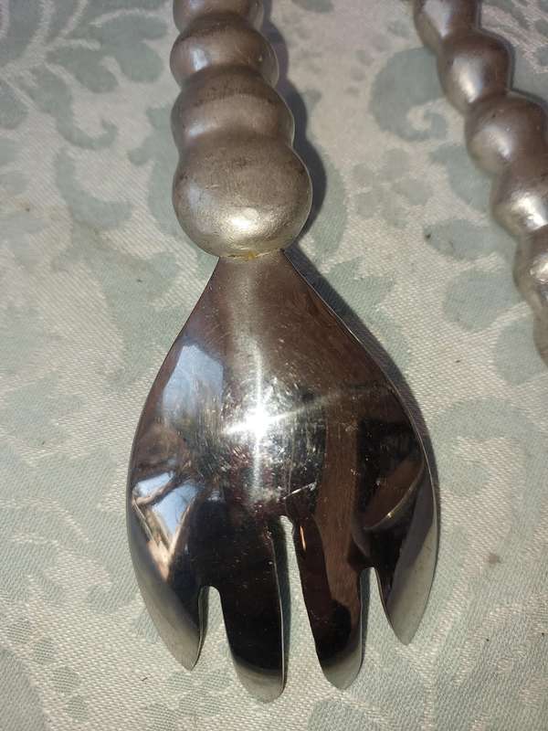 AN ORNATE SET OF SALAD ladles