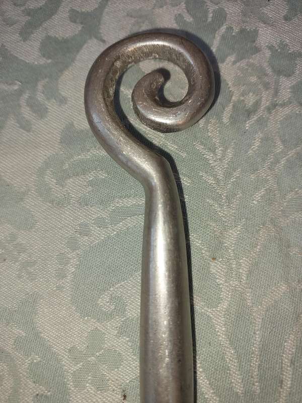 A PAIR OF PEWTEL CARROL BOYES STYLE CAKE CUTTERS SOLD AS IS