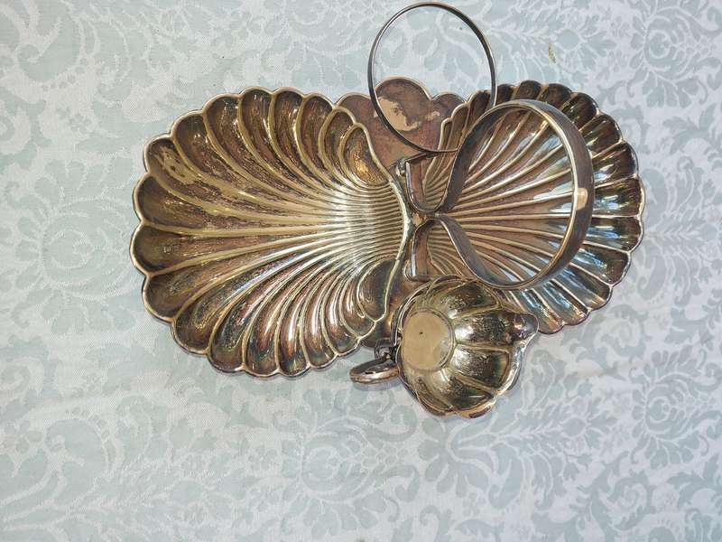 A VINTAGE BRIDAL BAROQUE SERVER FOOTED SOLD AS IS